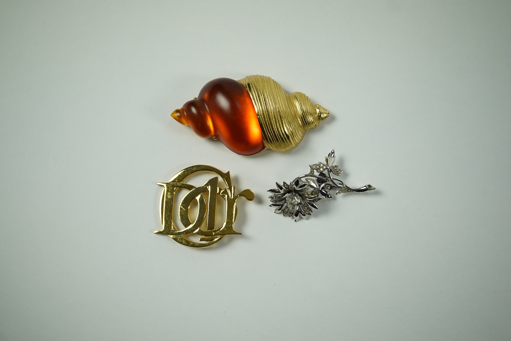 Three Christian Dior costume jewellery brooches